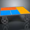 Colorful Dining Table With Orange And Blue Square Top And Metal Wheels