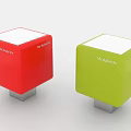 Two Colored Cubes With MySigns Text Red Green White Tops And Silver Bases