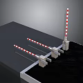 Red And White Striped Boom Gates With Metal Bases Installed On Flat Ground