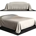 Two Views of Double Bed Covered with Light Colored Bedspread on Black Carpet