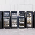 Black Kitchen Storage Appliances With Dishes Bowls In Row Light Colored Walls Floor