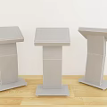 Three Modern White Commercial Equipment Stands With Digital Touchscreen Displays