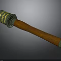 Green Military Grenade Featuring Yellow Text And Wooden Handle Design