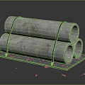 Concrete Pipes Bound With Black Straps Stacked On Black Platform With Gravel Scattered Around
