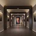 Elegant Hallway Interior Design With Wooden Accents Black White Photos And Red Artwork