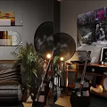 Entertainment Room With Computer Monitor Headphones Game Controller Laptop Game Console And Small Figurines