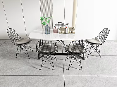 Modern Table and Chairs Set with White Round Top Black Mesh Seats Green Plant Vase 3d model