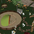 Circular Outdoor Recreational Space With Green Lawn Stone Paths And Small Buildings