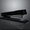 Office Supplies Stapler Black Modern Design With Metal Components And Reflective Base