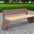 Roadside Bench With Wooden Seat Metal Frame On Paved Walkway Near Green Lawn And Trees