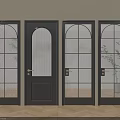 Black Hinged Doors With Various Glass Designs And Arched Tops In Interior With Wooden Flooring