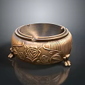 Ornate Brass Ashtray Featuring Intricate Carved Rose Patterns And Decorative Feet