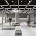Modern Clothing Store Interior With Metallic Ceiling Curved Counter And Open Layout Clothing Displays