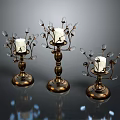 Set Of Three Decorative Brass Candle Holders With Ornate Glass Accents