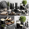 Elegant Modern Tableware Set With Black Plates Donuts Chocolate And Green Plants