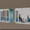 Comfortable Public Chairs in Glass Cubicles with Blue Sofas and Chatting People