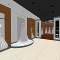 Elegant Bridal Shop Interior With Wedding Dresses Wooden Displays And Illuminated Showcase