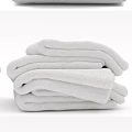 Three Soft Gray Rolled Towels Ideal For Bathroom And Daily Use