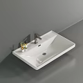 Modern White Ceramic Washbasin Design With Chrome Faucet And Decorative Items