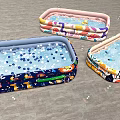 Colorful Patterned Inflatable Pools With Bubbles And Playful Designs For Kids