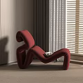 Unique Red S Shaped Lounge Chair Near Window With Blinds Light Walls And Carpet
