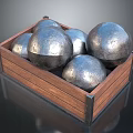 Multiple Shiny Silver Round Metal Balls in Wooden Storage Box