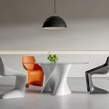 Modern Dining Table Set With Unique White Base White Orange Black Chairs And Green Plant