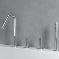 Modern Silver Faucet on White Countertop with Gray Wall Background and Small Spouts