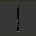 Black Wooden Clarinet with Gold Accents and Reflection on Black Background Surface