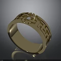 Elegant Golden Ring With Intricate Filigree Patterns And Central Gemstone