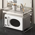 White Microwave Oven On Glass Shelf With Mug And Pen Holder In Kitchen