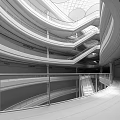 Modern Shopping Mall Interior With Curved White Ceilings Escalators And Retail Stores