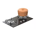 Kitchen Gas Stove With Black Surface Burners Control Knobs And Pot With Lid