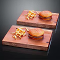 Two Delicious Hamburgers with Crispy French Fries on Wooden Serving Boards