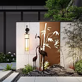 Outdoor Feature Wall With Carved Bamboo Pattern Crane Sculptures Chinese Lantern Green Plants And Rocks
