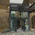 Historic Stone Building Cafe With Modern Glass Entrance And Cobblestone Ground