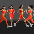 Four Women Running in Bright Orange Sportswear Against Dark Background