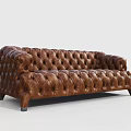 Classic Brown Tufted Leather Sofa With Button Details And Sturdy Wooden Legs