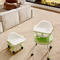 White and Green Baby High Chairs with Tray on Wheels in Living Room
