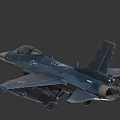 Blue Camouflage Fighter Jet With Japanese Military Markings And Mounted Missiles