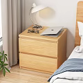 Wooden Two Drawer Nightstand With Laptop Glasses Table Lamp by Bed Near Curtains and Plant