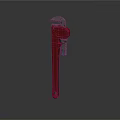 Red Adjustable Pipe Wrench Sturdy Plumbing Tool With Metal Jaws And Handle