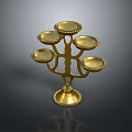 Golden Decorative Candelabra With Multiple Candle Holders And Ornate Base
