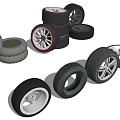 Various Car Tires And Wheels Display With Stacked And Single Rims