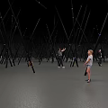 Interactive Playground with Black Poles and Blue Lights for People to Enjoy Playing