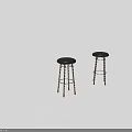 Black Leather Bar Stools With Black Legs And Gold Twisted Details