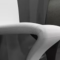 Modern White and Black Accent Chairs with Sleek Curved Lines in Interior