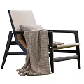 Modern Comfortable Leisure Chair With Black Frame Beige Cushion And Knitted Blanket