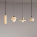 Modern Minimalist Pendant Lights With Four Unique Designs Hanging Against Grey Background