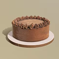 Round Brown Cake With Cream Decorative Border On White Plate 3d model